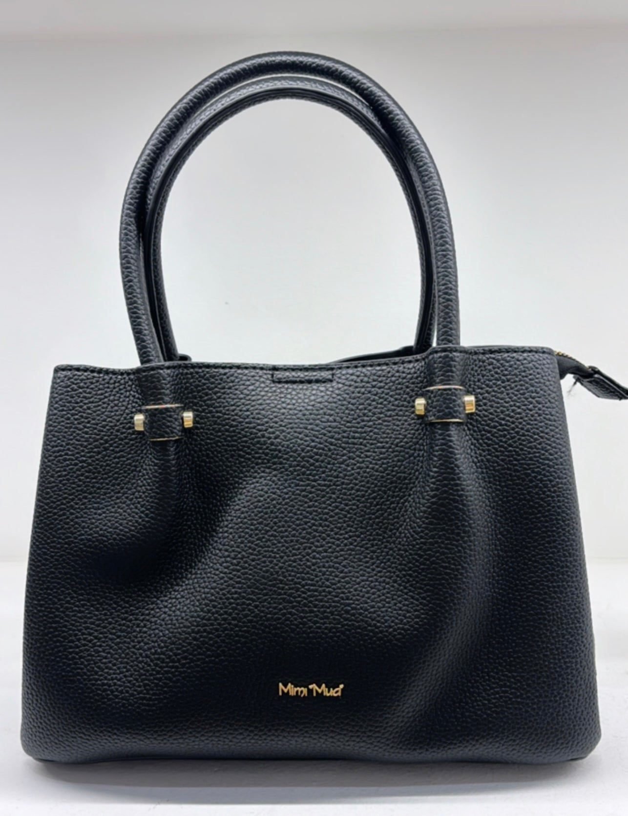 BORSA A MANO CON RIFINITURE IN TINTA